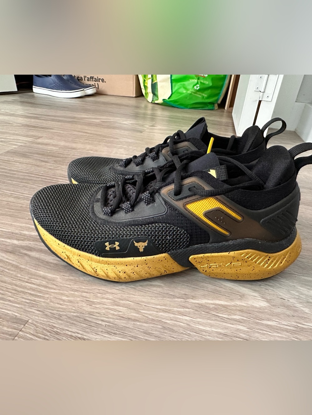 Under Armour Black and Gold Project Rock Training Sneakers Men 8.5 Women 10